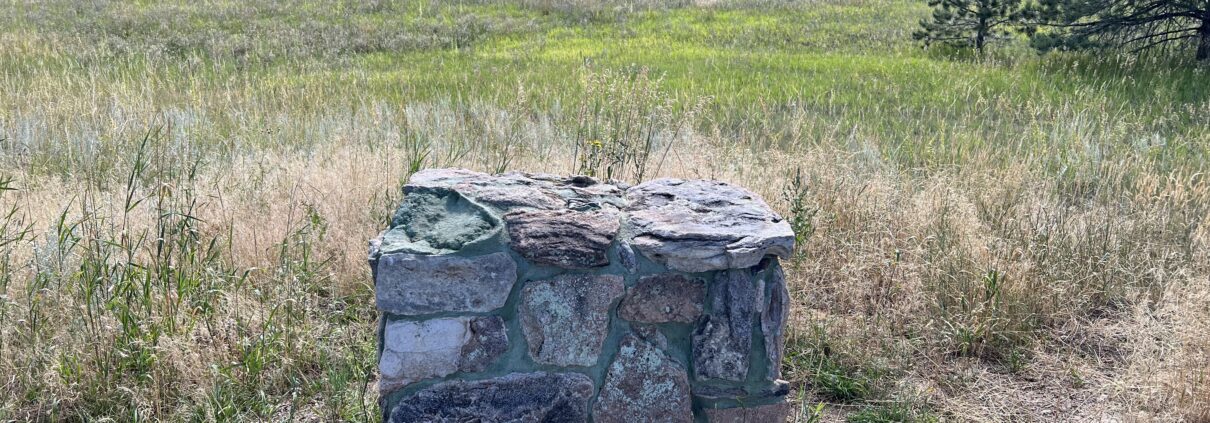 Empty pillar where interpretive sign once stood.